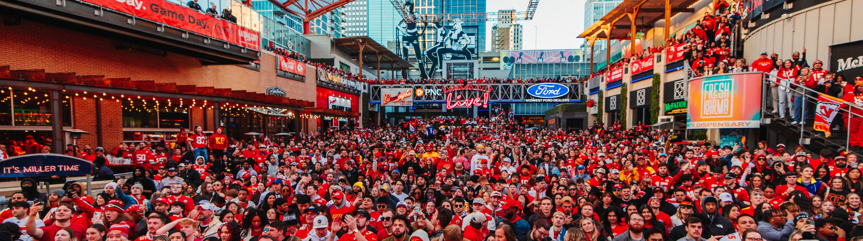 Kansas City Chiefs footballs fans outdoors at KC Live!, Power and Light District.